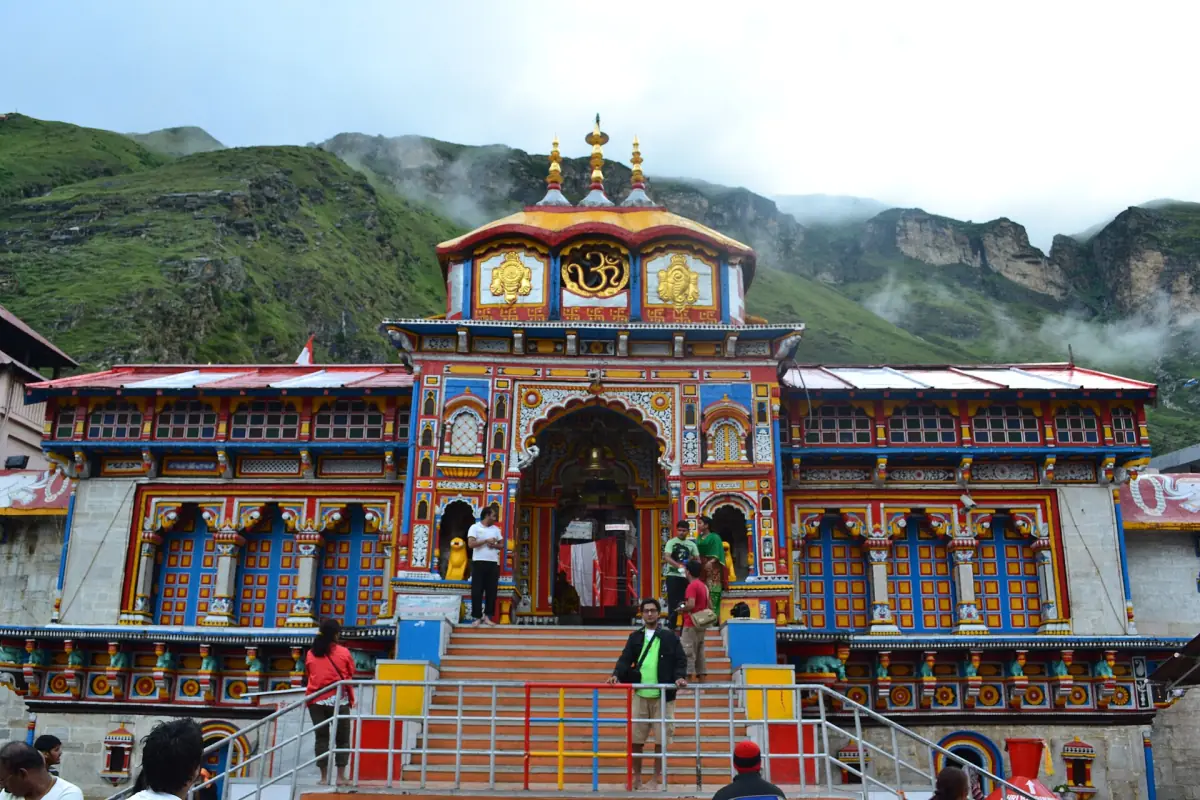 Front view of Badrinath Temple with its entrance stairs and mountain slopes