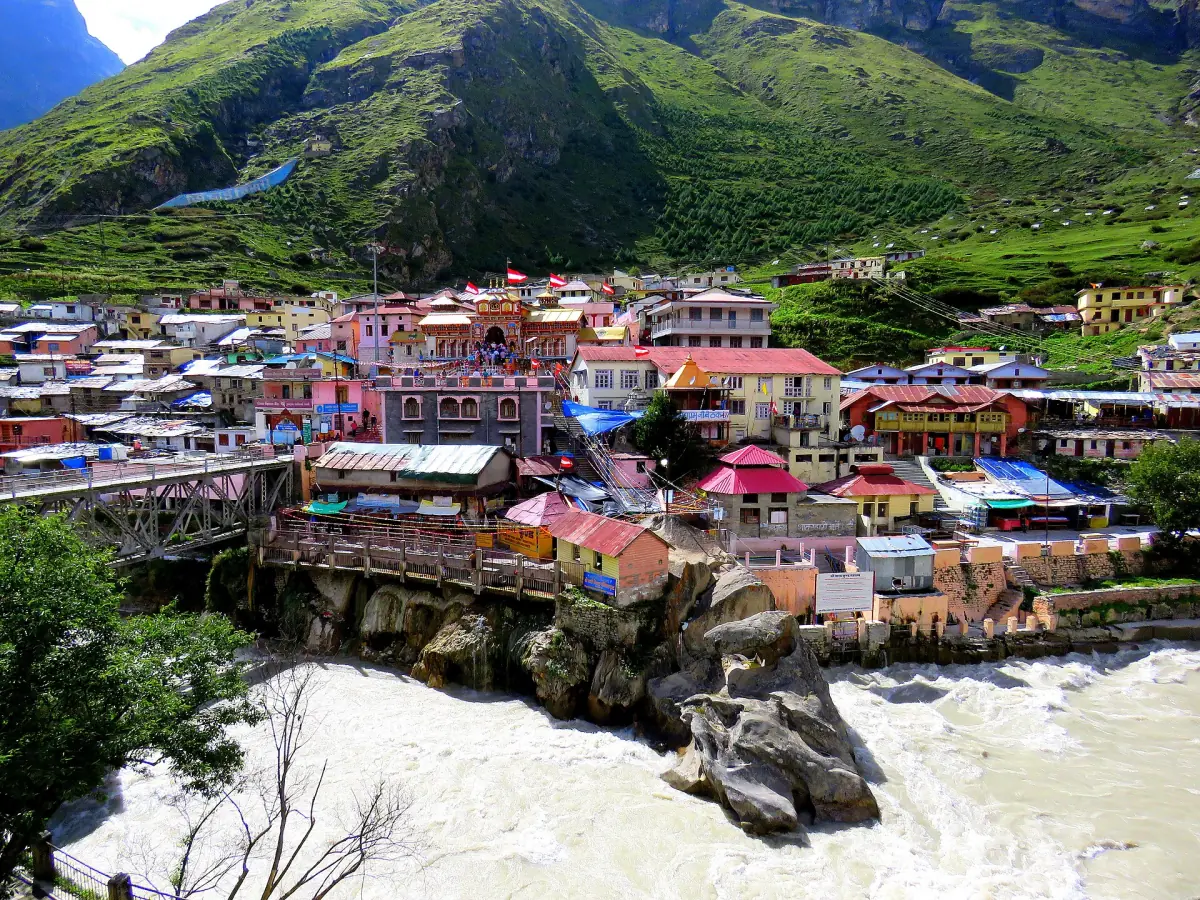 Badrinath town in its green valley with the Alaknanda flowing below